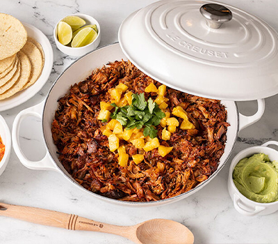 Tacos à l'épaule de porc braisée avec salsa d'ananas grillé