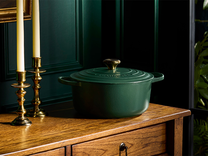 Forêt cookware in a dark green kitchen